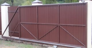 Купить откатные ворота из профнастила Южно-Сахалинск, цена от 1795 руб.